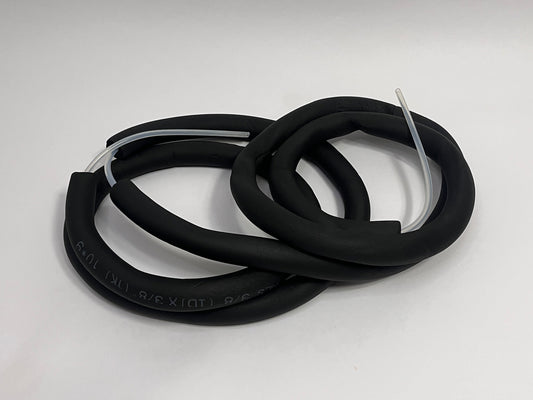 coiled 4 meter long silicone tubing with black insulation tubing on it showing ends with silicone tubing for race car hydration feeding