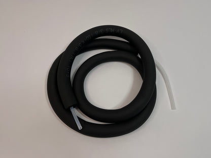 coiled 2 meter long silicone tubing with black insulation tubing on it showing ends with silicone tubing for motorsport hydration