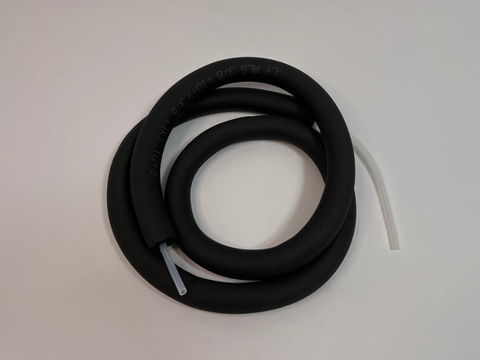 coiled 2 meter long silicone tubing with black insulation tubing on it showing ends with silicone tubing for motorsport hydration