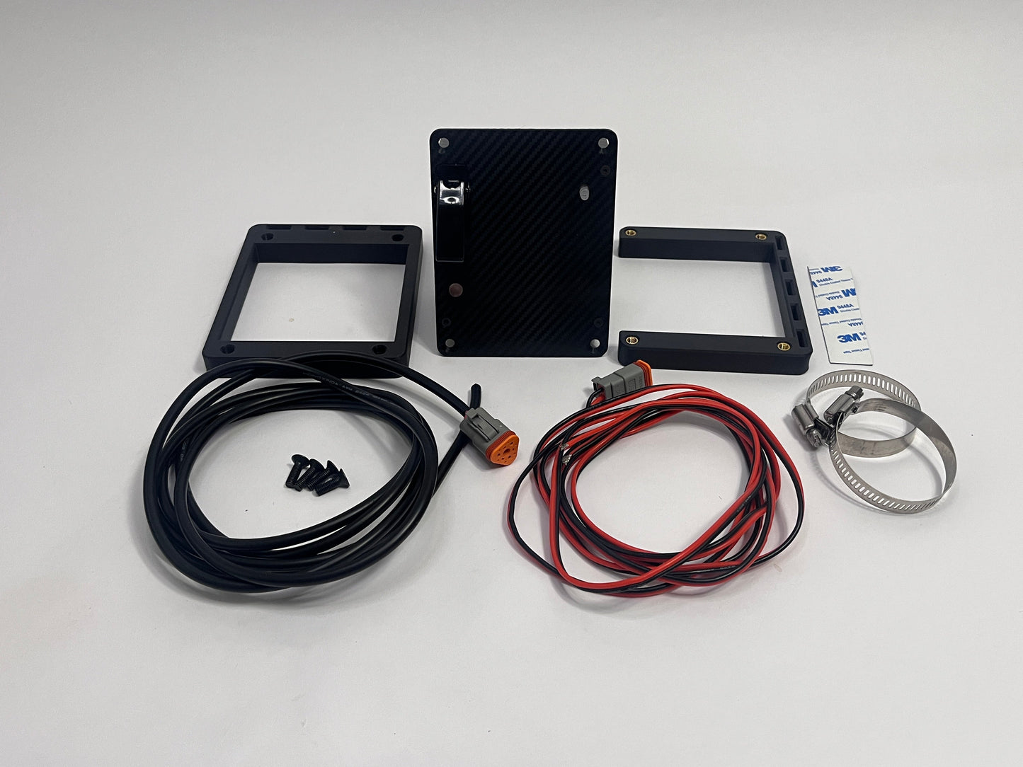 all parts included in the motorsport hydration unit kit showing the race car drink pump, a vertical and horizontal mount, 2 deutsch connectors with cables, 2 roll cage mounts, 3m backed rubber and mounting bolts. on a white background
