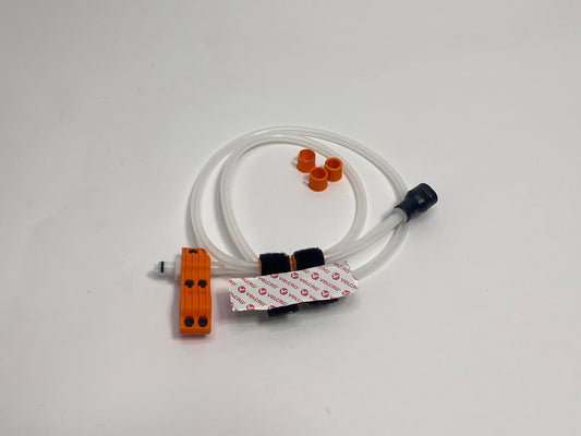single driver side motorsport hydration kit showing orange dry break fitting holder, 1m silicone tubing connected to it with 3 spacers shown loosely. black silicone bite valve is connected to the tube and velcro positioners connected to the tubing on a light gray background
